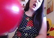 View Nicoletta’s balloon challenge and seeing her fetish for balloons