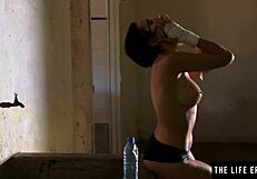 Wearing her skintight Sports bra and her members only chest, an athletic girl pleasures herself in a boxing gym