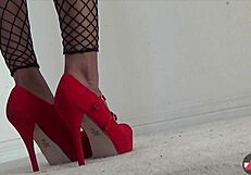 Watch a skinny girl mastering handjob in fishnets and getting her load of a cumshot