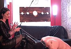 Dominatrix Nicky’s boots get licked by her slave