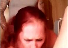 Mature red-haired woman fucking with two inexperiencedmen