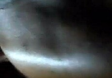 African American woman gives a blow job and performs analingus on a penis