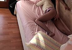 A hard loaded spunk enabling into the fishnet stockings