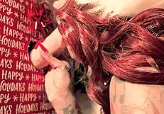 Outstanding head with red hair as a Christmas gift