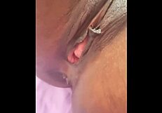 Beautiful seductive African American woman touching herself