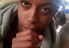 Young submissive performs a poor blowjob, uses tongue on the balls, and swallows the juices