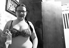 An old style amateur video of curvy milf giving a sensual blowjob and getting a handjob