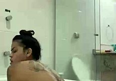 We meet a gorgeous Bia with red lips and brunette hair having a sexual self enjoyment in the washroom