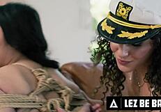 Sailor Liv Revamped binds neighbor Avery Black with ropes for intense lesbian domination.