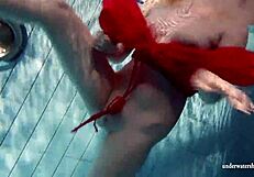 Russian teen Lucie takes a swim in one of the most amazing pools