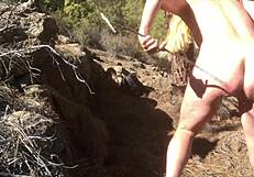 SHEMAll outdoors nipple tease for a submissive shemale