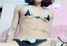 Peachy Asian muscle girl Almost naked in a housemaid outfit and biting her lower lip before a sex tape_primary clip