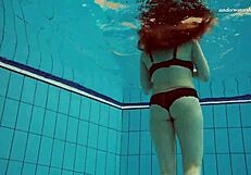A girl named Vesta who is a Czech girl went swimming in the pool naked