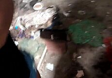 A young man giving oral sex to a new sexual partner in an abandoned house in Recife, Brazil