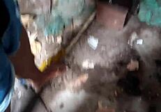 A young man giving oral sex to a new sexual partner in an abandoned house in Recife, Brazil