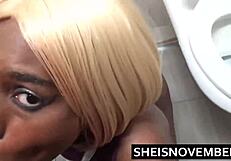 Gorgeous skinny African American girl with a big natural tits BJ perils in a fast food joint while actively staring at the camera