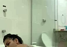 Hot brunette Bia has a wet and spicy bath steamy solo session in the bathroom