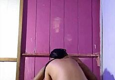 A fully equipped partner penetrates the ass