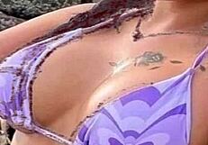 Pleasing oneself at the beach sketching a sexy bikini babe
