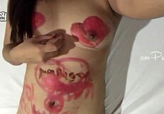 Sensual solo art session on her bare Asian skin