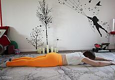 An exotic exercise expert does not shy away from displaying her cleavage