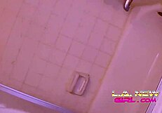 Sultry scene of a young haired blonde having a shower and having a very steamy shower session