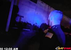 Two police officers who are into men give a hardcore blowjob to a black man outdoors.
