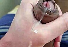 Young boy with a big cock masturbates and ejaculates