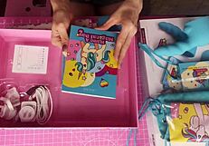 Unboxing a limited edition Unicorn Wand set from LE Wand for a petite blonde