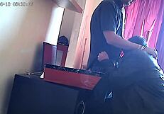 Office worker gives blow job to the boss in the office