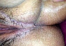 Amateur house video with a hairy and chubby girl spreading her wet pussy