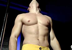Hot gay strip tease with acrobatic moves and pole dancing