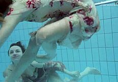 Anna Netrebko and Lada Poeschuk in an underwater shower scene