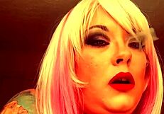 Chubby British domme Tina Nua smokes a Superking