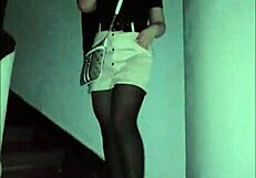 Femdom in leather catsuit and pantyhose with miniskirt