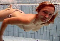 Iva brizgina shows her ass in the pool