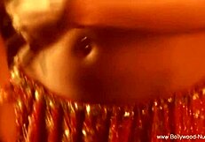 Sultry brunette gets naked and performs erotic belly dance