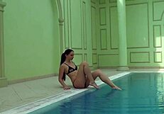 Kittina ivory swims in the pool and undresses