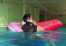 Kittina ivory swims in the pool and undresses
