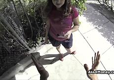 Young man in financial trouble uses a payphone and then gives a blow job
