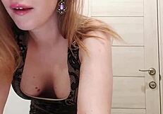 Big-boobed blonde MILF's solo session in the toilet stall