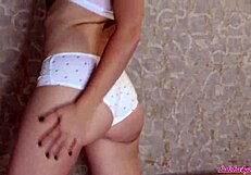 Beautiful brunette gets off alone in these hot photos