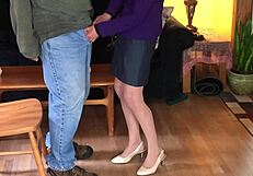 Hot milf in nylons gives young neighbor a handjob
