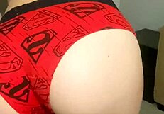 Close up of a faceless man trying on panties from my MV store