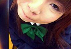 A young Japanese woman has sex in a classroom setting