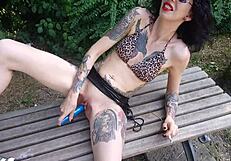 Public park fun with smoking and dildo play