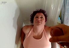 Liza enjoys a golden shower and a messy cumshot
