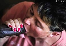 Granny with a golden heart enjoys sucking on a black shaft