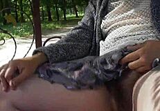 Hairy mature flashes upskirt in public carriage outdoor. Part 2 shows more.