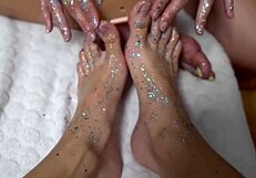 Footplay with two cute girls, shiny legs, huge toy